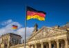 Terror Plots Exposed: Germany Cranks to HIGH German flag flying above the Reichstag building