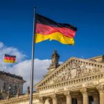 Terror Plots Exposed: Germany Cranks to HIGH German flag flying above the Reichstag building