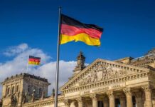 Terror Plots Exposed: Germany Cranks to HIGH German flag flying above the Reichstag building