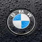 BMW hood emblem with raindrops