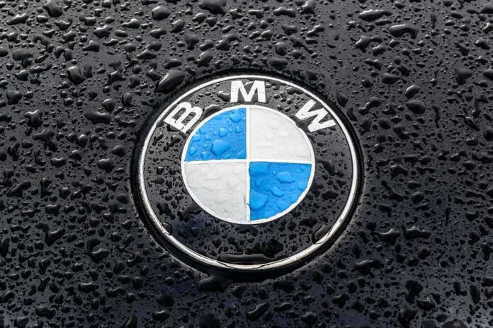 BMW hood emblem with raindrops