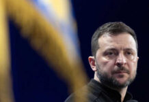 Ukraine War Cabinet Meltdown—Reformer Pushed Out Person with short hair next to blurred yellow flag