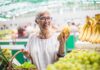 30% Off Food Could Put Some Out of Business Woman shopping for bananas at a market