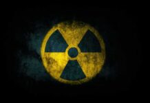 How Uranium Slipped Into China-Bound Cobalt radiation hazard symbol on dark textured background