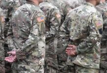 Veterans Hit 500M—But Did Anything Change? Soldiers in camouflage uniforms standing in formation