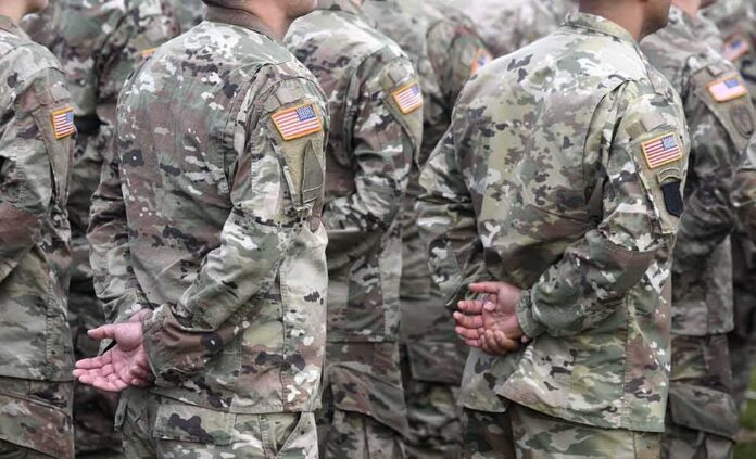 Soldiers in camouflage uniforms standing in formation