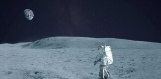Astronaut walking on the Moon with Earth in the sky