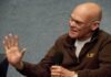 Carville’s Ultimatum Shakes Democrats Bald man speaking into a handheld microphone