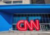 CNN Hit With Foreign Defamation Blast Exterior view of the CNN building with a large red logo and blue facade