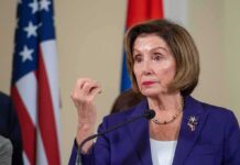 Pelosi Power Gambit Sparks Democrat Meltdown Woman in purple blazer speaking at a podium