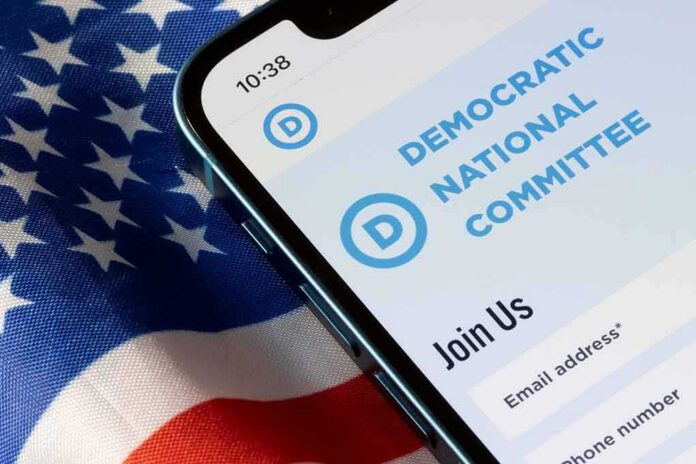 shutterstock_2223653467 Smartphone showing a political committee webpage on an American flag