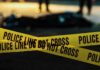 Blocked-In Standoff – Officers Down After Hartford Pursuit yellow police tape at a nighttime crime scene