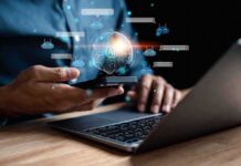 Left-Leaning Bots — Democracy On The Line Person using smartphone and laptop with AI hologram