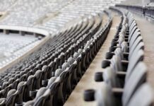 Outrage Erupts Over ‘Premium’ Blind Spots Empty stadium seats in curved rows