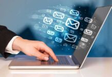 Google Bypasses Spam—Brace For Politics Hand typing on laptop with email icons emerging from screen