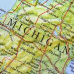 Map of Michigan highlighting central and northern towns and lakes