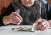Elder Scam Epidemic – Account Takeover Leaves Seniors Penniless Elderly person counting coins on a table