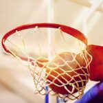 Basketball going through a hoop