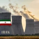 IAEA Bombshell Puts Tehran on Notice nuclear power plant cooling towers in Iran at sunset