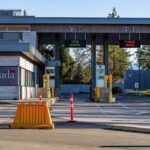U.S.–Canada Showdown: Who Blinks? Canada border crossing booths with open and closed lane signs