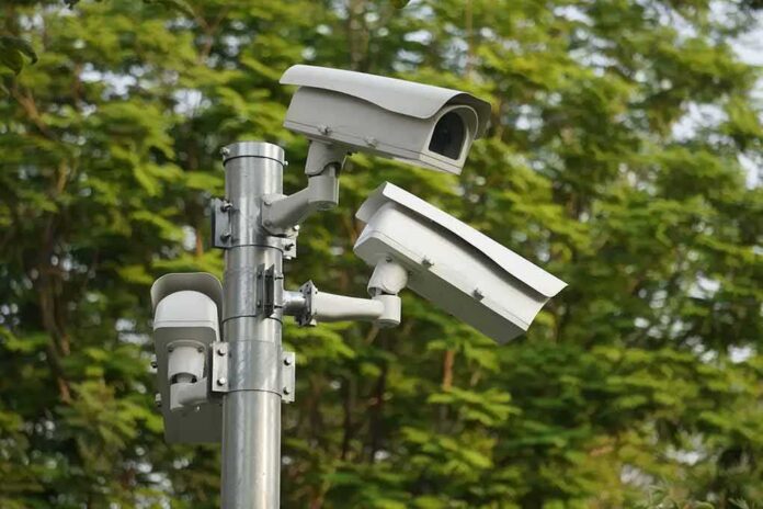 shutterstock_1924933001-1 surveillance cameras mounted on a metal pole