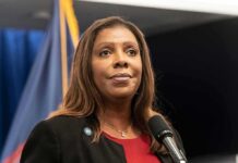 Letitia James Freezes Church Cash Woman speaking at a press conference microphone