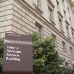 Internal Revenue Service Building sign outside a classical stone office building