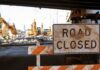 Historic Church Bulldozed – Sacred Ground Flipped For Fuel Road closed sign at construction site under overpass