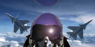 fighter pilot in cockpit with two jets flying in formation