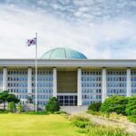 Homemaking Claims Billion-Dollar Slice Parliament building with a green dome and flagpoles
