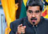 Chilling Indictment Ties Maduro To Torture Nicolás Maduro speaking at a podium, pointing forward