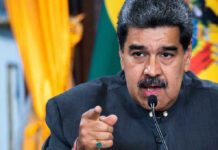 Chilling Indictment Ties Maduro To Torture Nicolás Maduro speaking at a podium, pointing forward