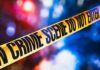Inside The Million-File Mystery – Chew Avenue Horror Gets Bigger yellow crime scene tape with blurred police lights