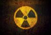 Radiation hazard symbol on a grungy surface