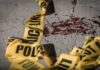 Vienna Chaos: Midnight Gunfire Shocks Georgia Town Crime scene tape near blood on pavement