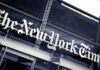 Rhetoric On Trial – Impeach The President? The New York Times sign on a glass building facade