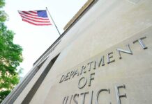 U.S. Indicts Castro Over Civilian Shootdown Department of Justice building with American flag