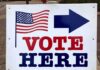 Noncitizen Vote Ban Gutted – For Now voting sign with arrow and American flag
