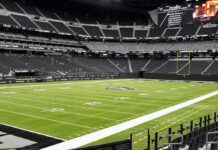 Dragged For A Shirt – DOJ Wants Answers American football stadium interior with empty field and stands