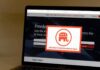 GOP Meltdown: Senator Dangles Trump’s Digits Laptop screen showing a political committee website with a popup featuring an elephant logo
